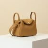 HERMES Lindy 19 Crossbody Bag in Biscuit Clemence Leather with Gold Hardware